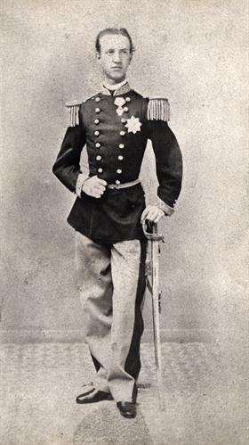 Uniform worn by the  King George during his arrival in Athens in 1863. It consists of a blue tunic, a grey pair of trousers, a kepi and epaulets.