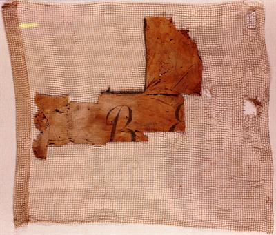 Part of a military flag of the Ottonian period, 1833-1862. In the center of the cross it bears the initials: B’ E T (2nd Light Infantry Battalion).