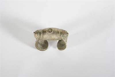 Bracelet, called &quot;Engagement of Thrace&quot;. It is tripartite, made of gilded silver, open at the bottom, with mastoid appendices and leaf-shaped edges.