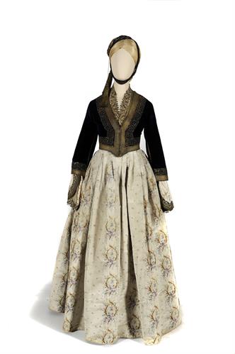 Urban costume, &quot;Amalia&quot; type, which belonged to Theofani Chatzopoulou, nee Staikou. It consists of a gossamer silk tunic, a pleated silk dress with wide sleeves and a blue velvet waistcoat (&quot;kontogouni&quot;). The costume is completed with a red fez with a sil