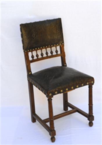 Chair made by wood and leather, baring the initials of Lazaros Koundouriotis «LC», Lazaros Koundouriotis Historic Residence on Hydra Island