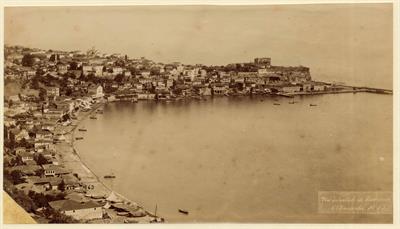 View of the wider area of the port of Dafnountas and part of the homonymous district of Trabzon, Pontus. The mole, the custom house, Leontokastro and the church of Agios Gregorios are visible. Photograph by Kakoulis Brothers, 1890&#039;s.