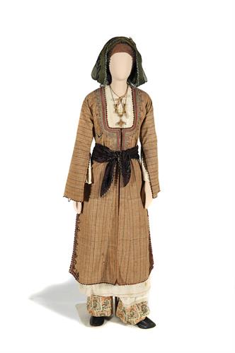 Festal costume from Karpasia, Cyprus. It consists of the breeches (&quot;vratzin&quot;) with added fully embroidered ends (&quot;provatzia&quot;), a tunic of cotton material, and a straight open coat (&quot;sayia&quot;). Print kerchiefs are worn on the head, 19th century.