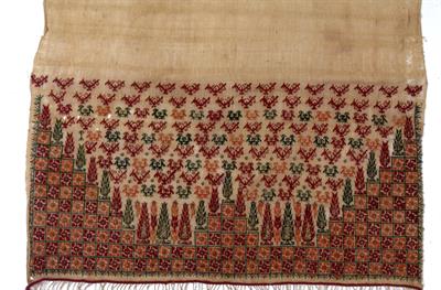 Towel from a bride&#039;s trousseau from Skyros decorated with cypress trees, swastikas and small stylised birds, worked in fine silks, 19th century.