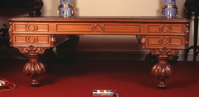 Woodcut desk of King George I (1863-1913). Its surface is covered with green leather